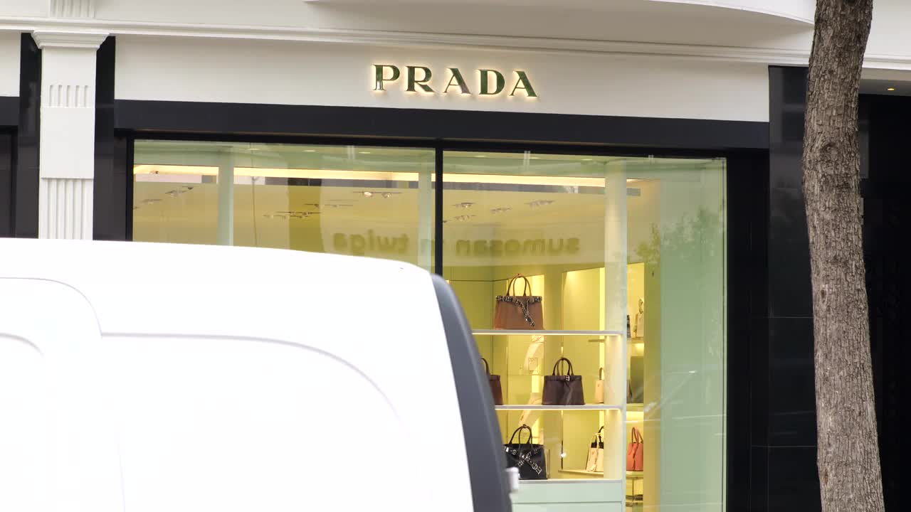 Luxury Fashion Storefront Featuring Prada Display