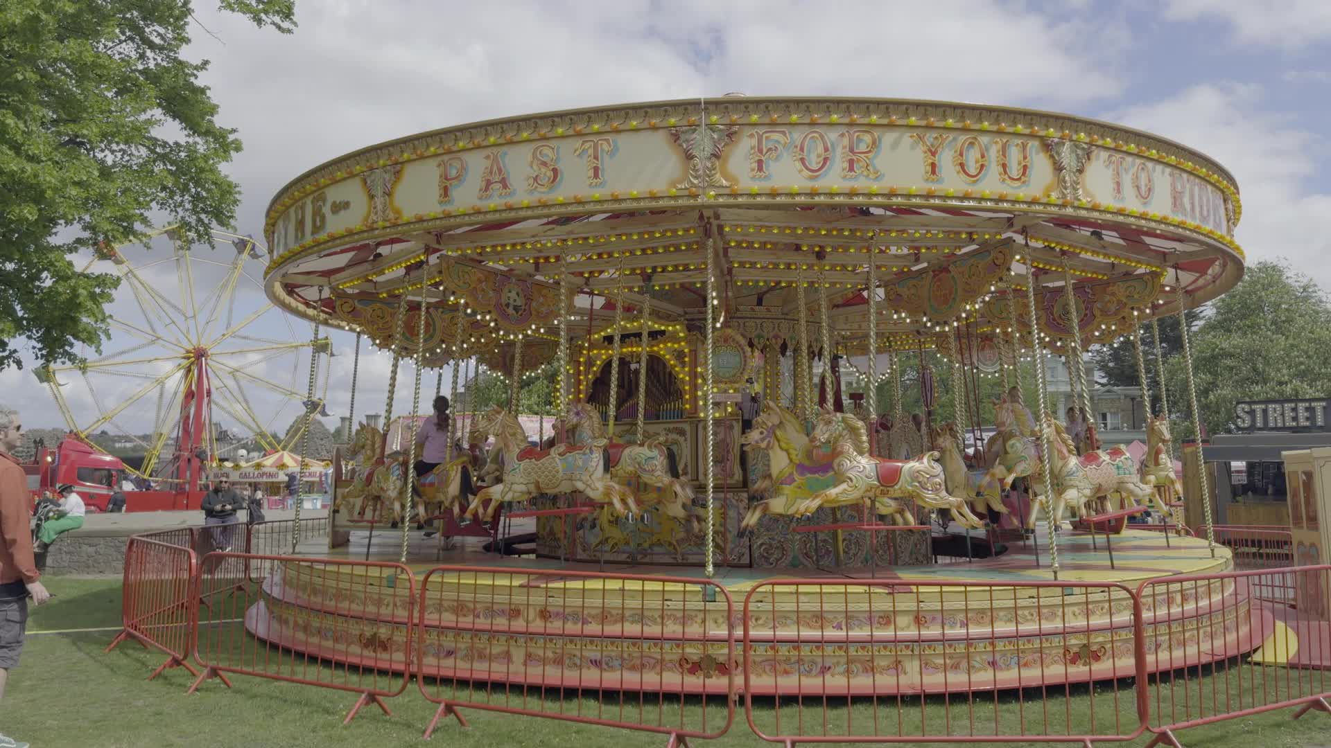 Vintage Carousel at Rochester Fair with Ferris Wheel
