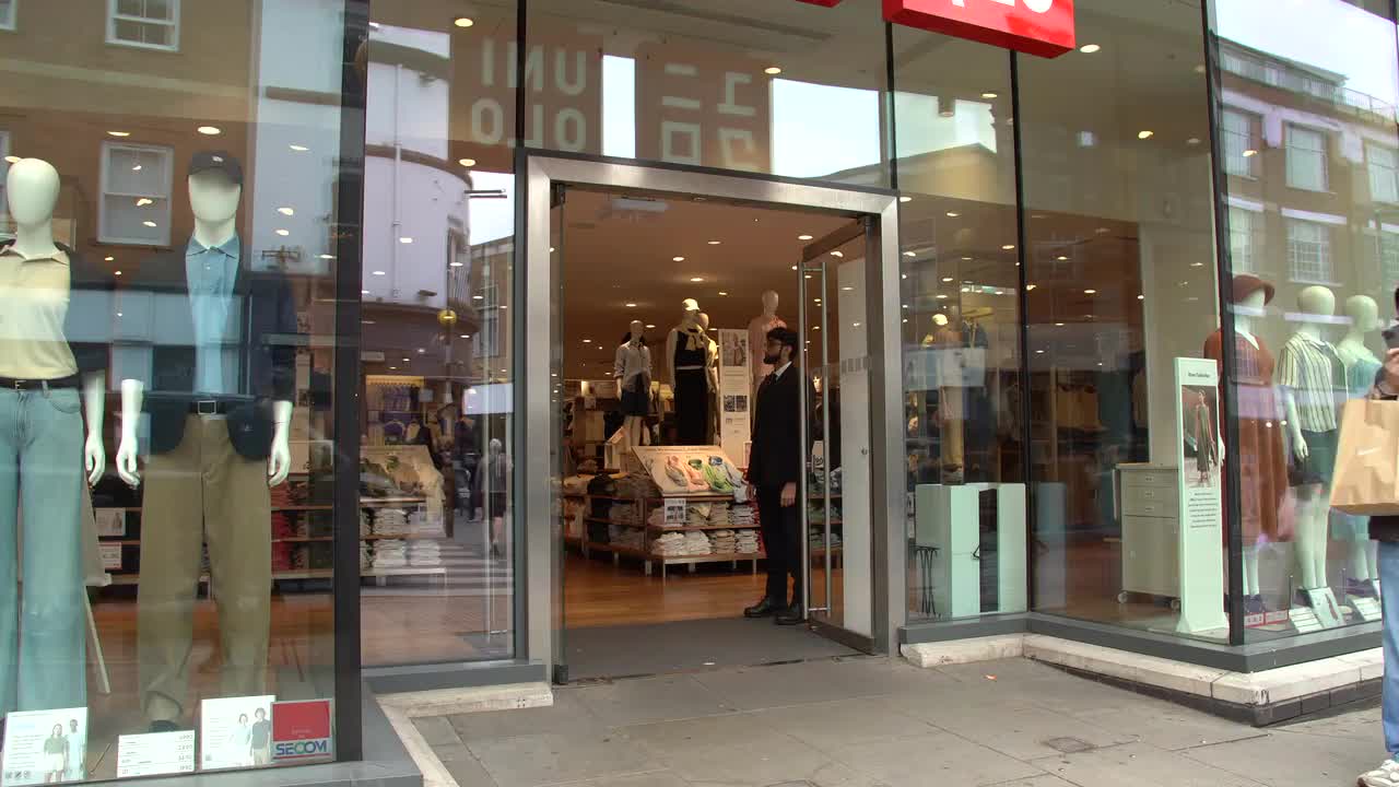 Uniqlo Storefront on Busy Urban Street