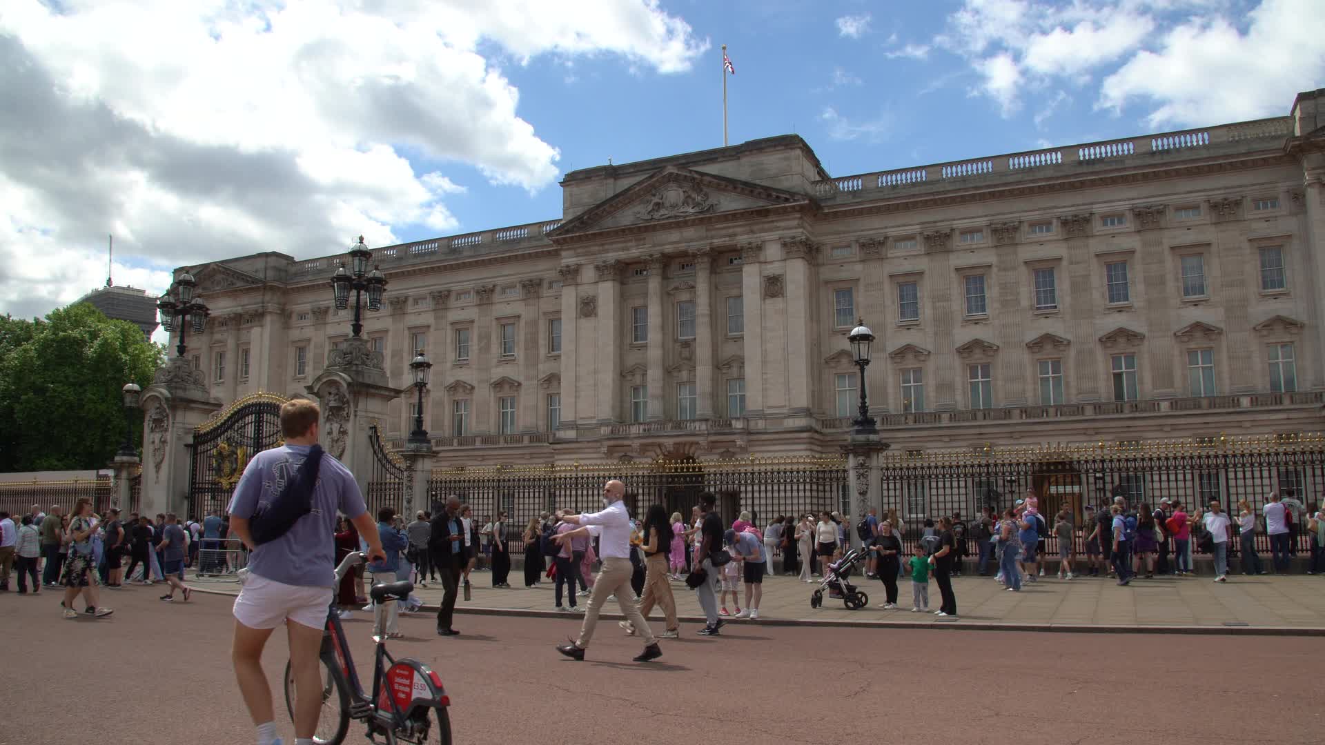 Buckingham Palace Exterior with Tourist Activity