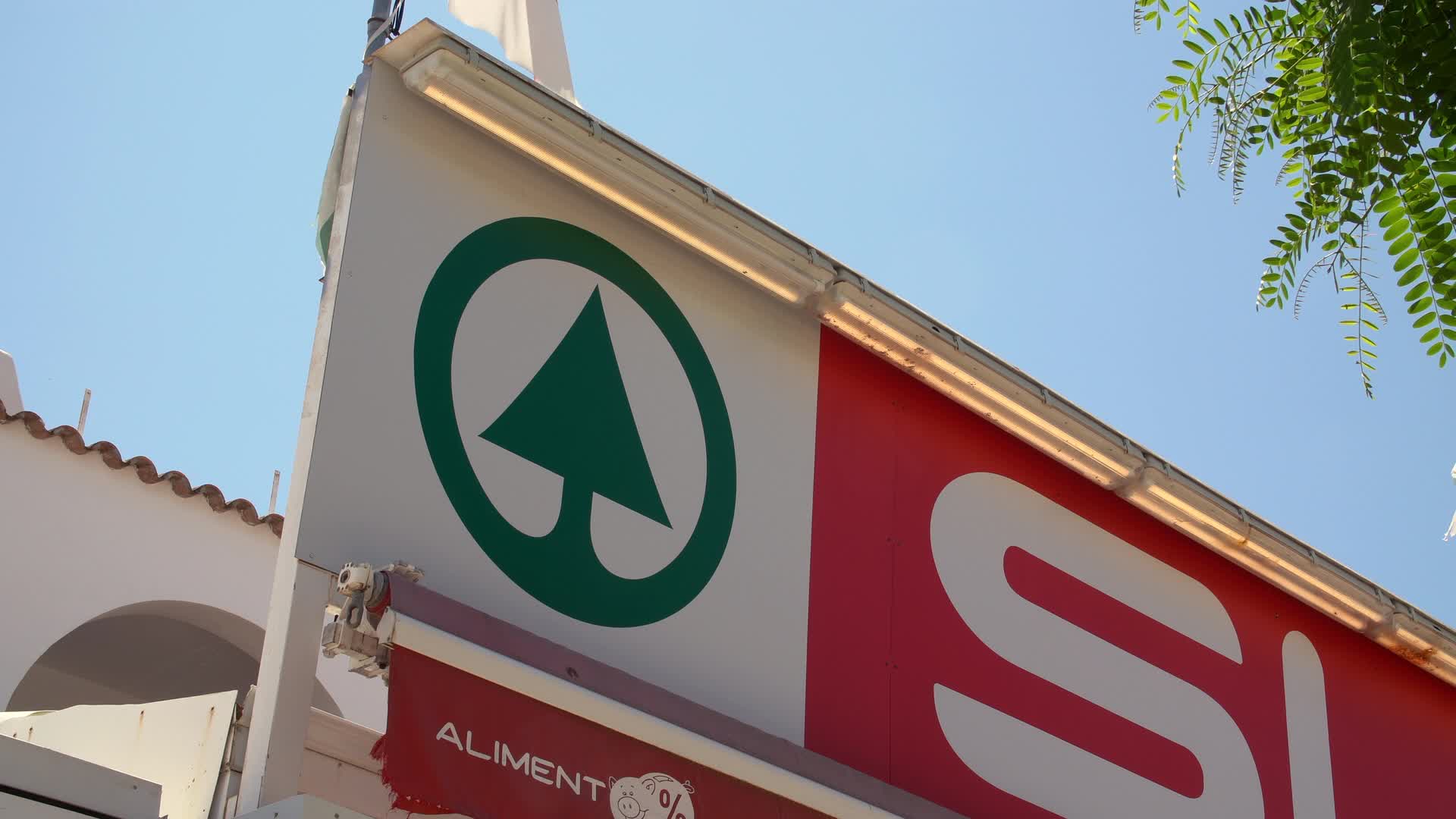 SPAR Supermarket Sign Under Clear Blue Sky in Cala d'Or, Mallorca, Spain