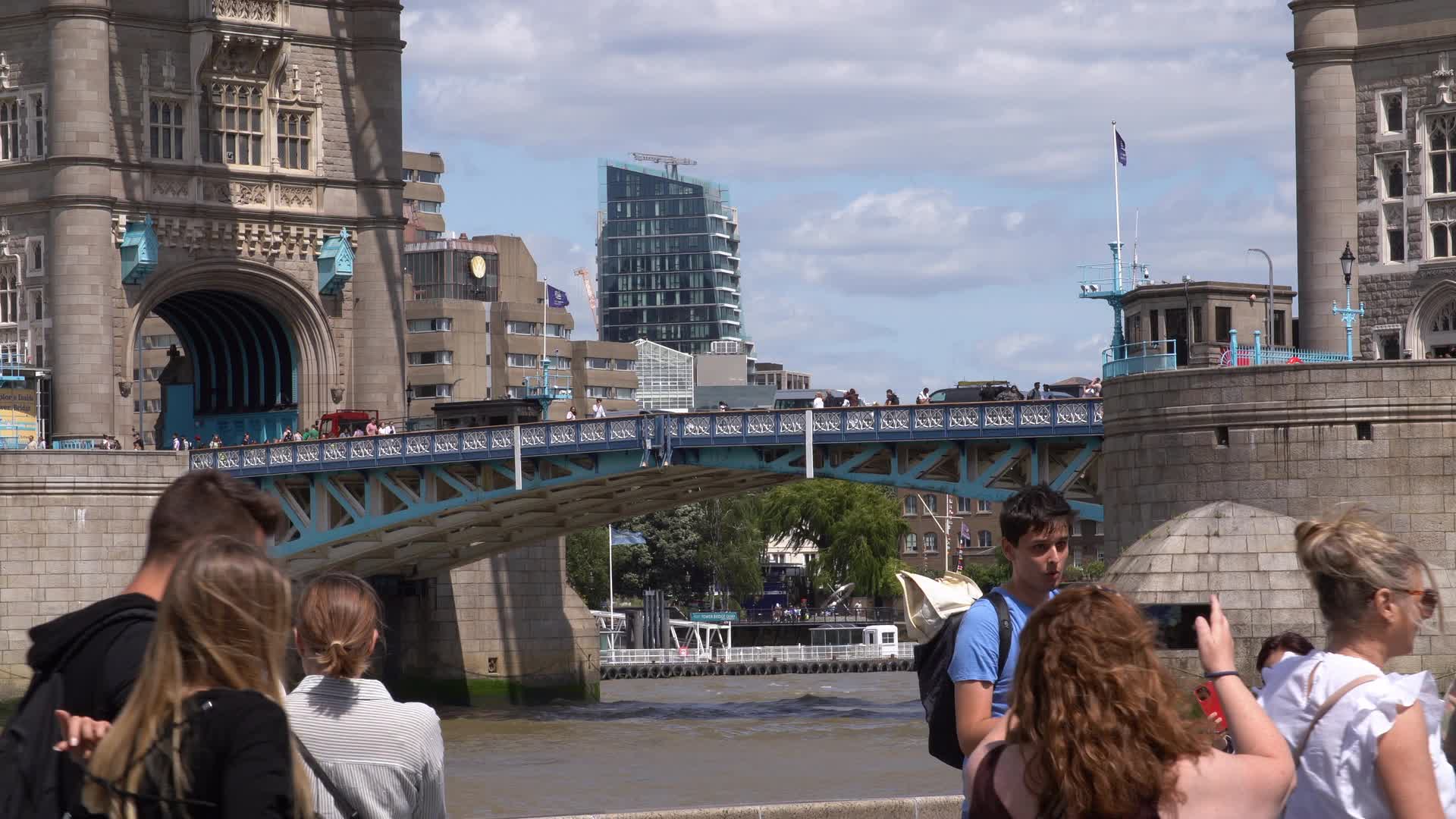 Tourists at Tower Bridge on a Sunny Day