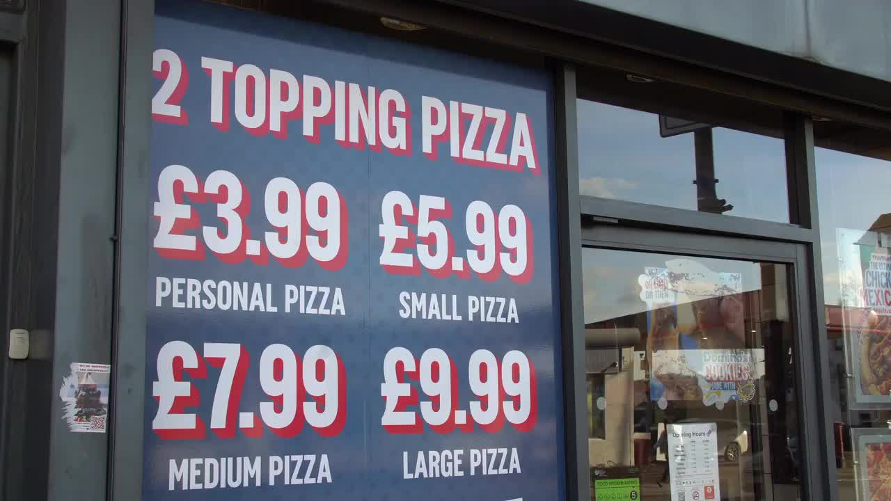 Pizza Shop Front with Price Board