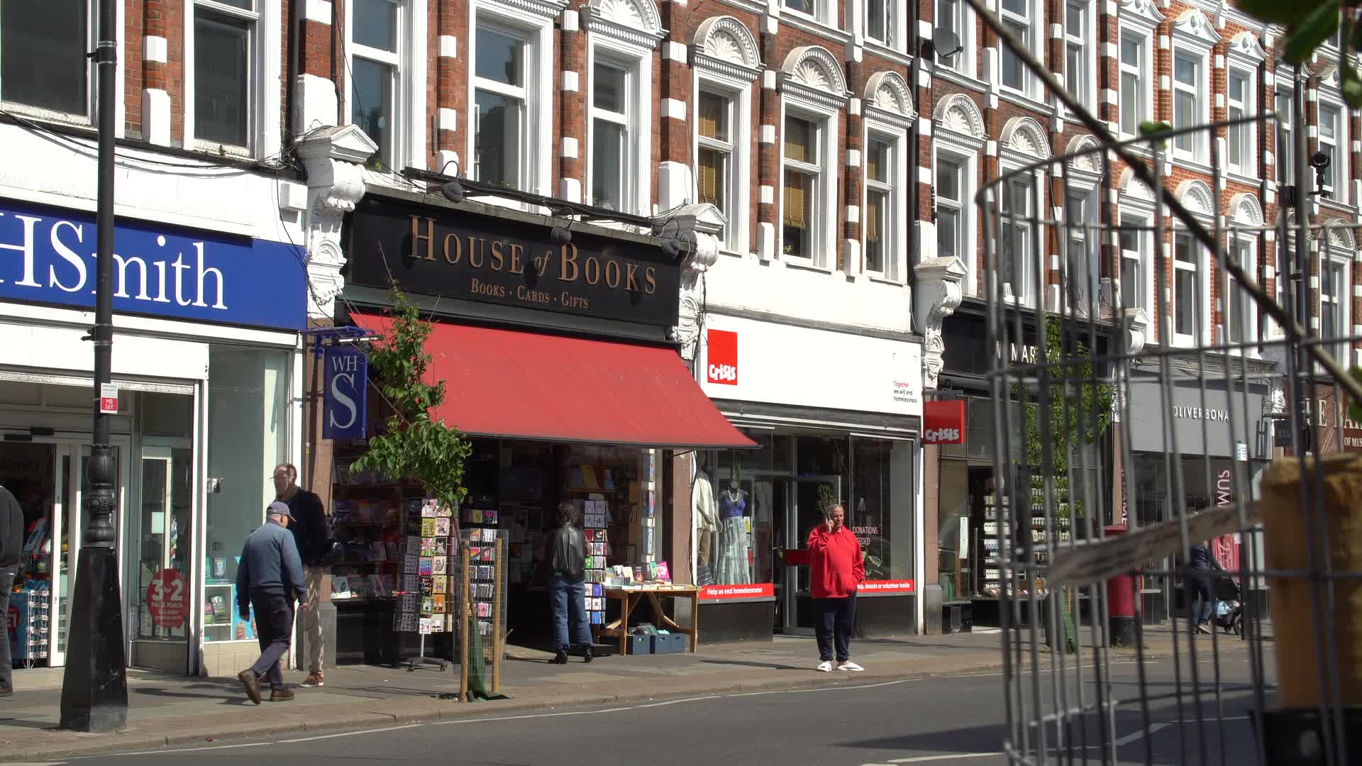 Urban Street Scene with Bookstore and Retail Shops