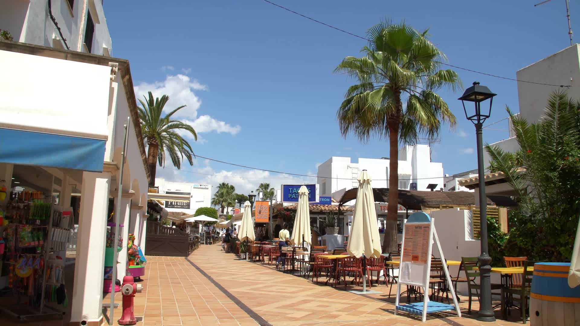 Relaxing Urban Scene on Sunny Day in Cala d'Or, Mallorca, Spain