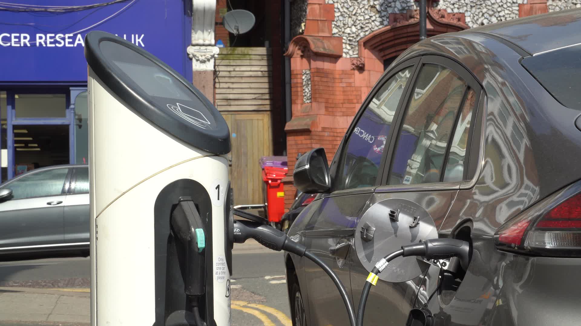 Electric Vehicle Charging on a London Street