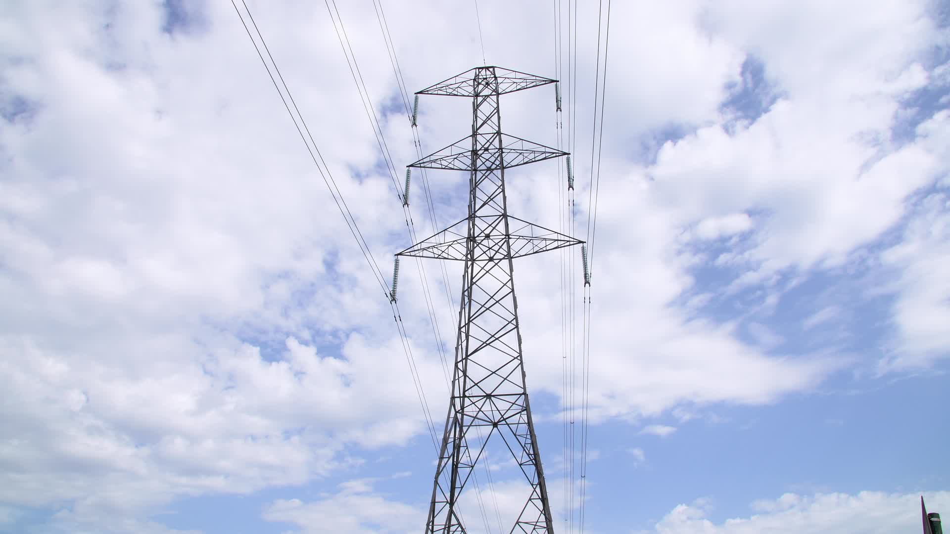 Electrical Pylon Against Cloudy Skies in the UK 