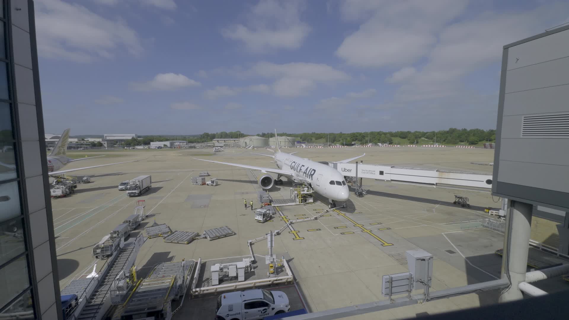 Gulf Air Aircraft at Airport Gate on Clear Day