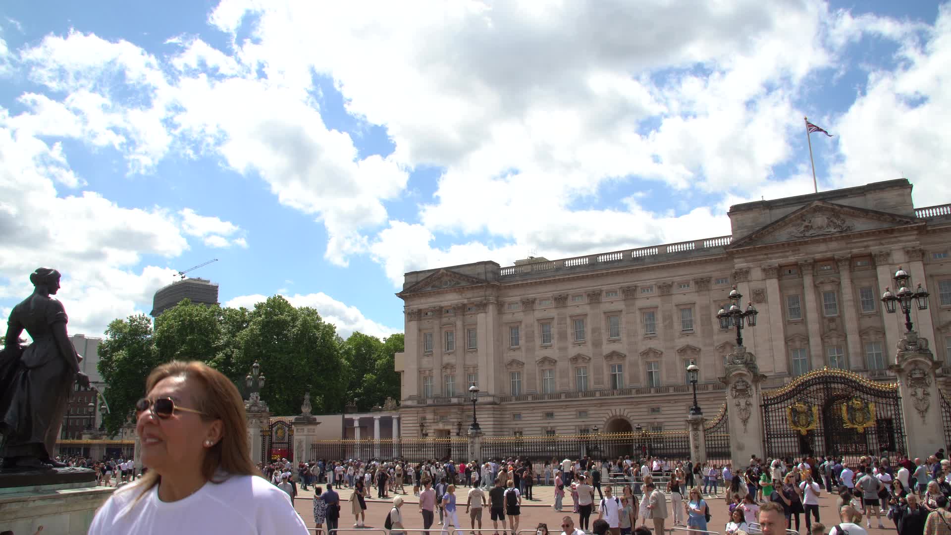 Tourists at Buckingham Palace in London, UK