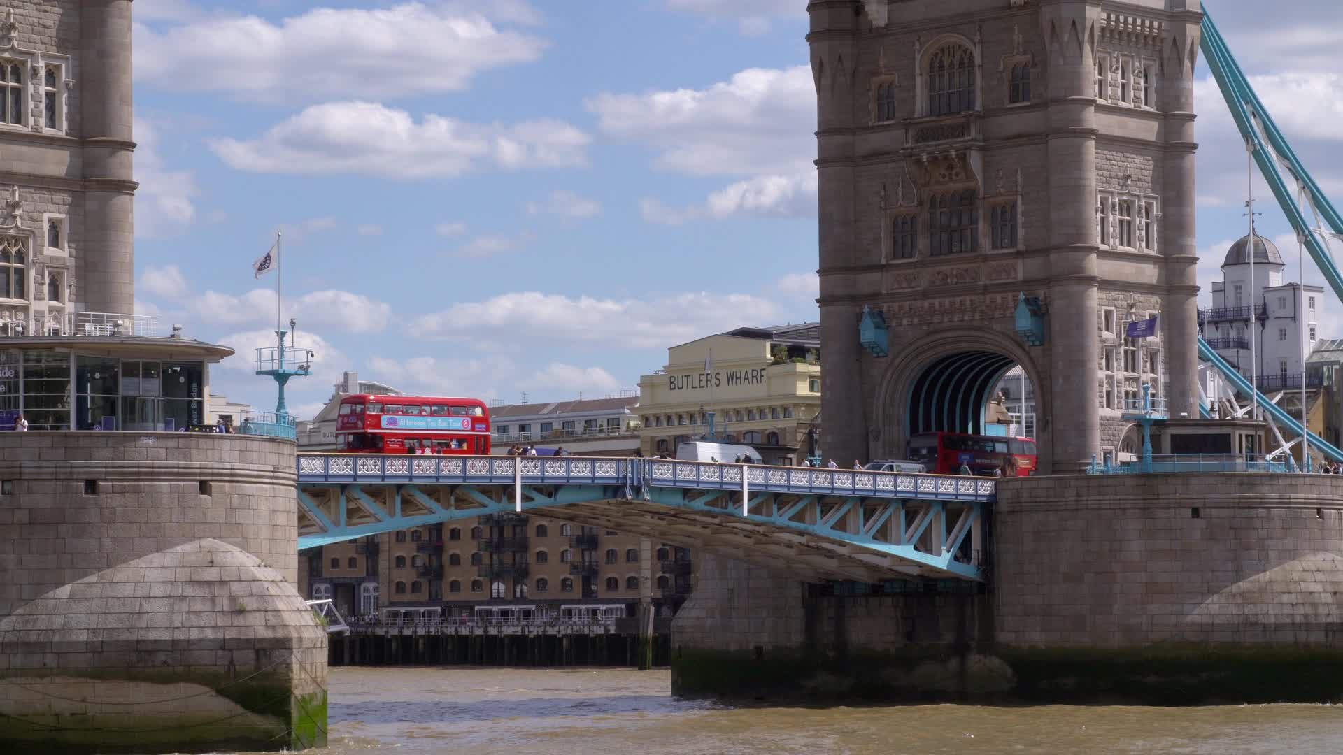 Tower Bridge with Red Buses on a Sunny Day