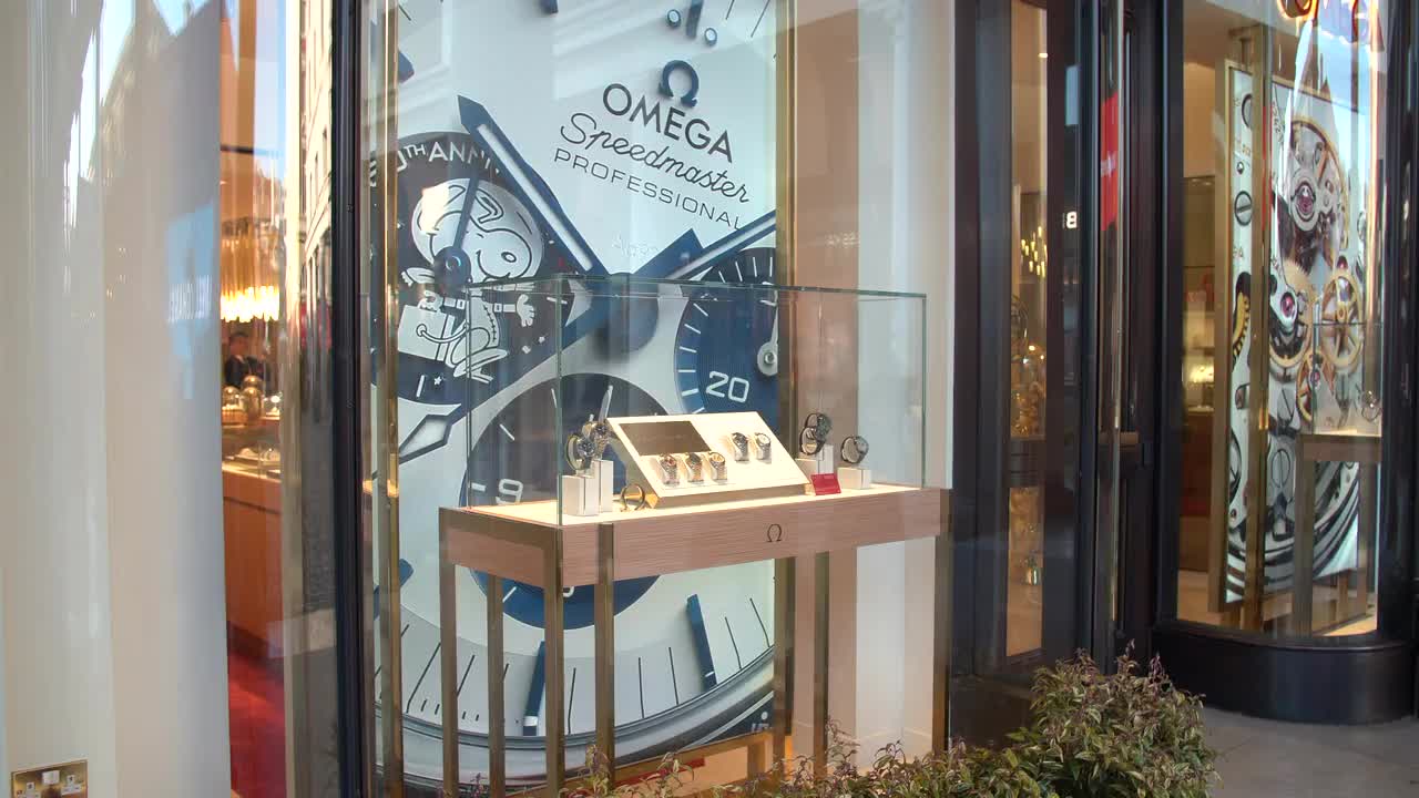 Luxury Watch Storefront Display Featuring Omega Speedmaster