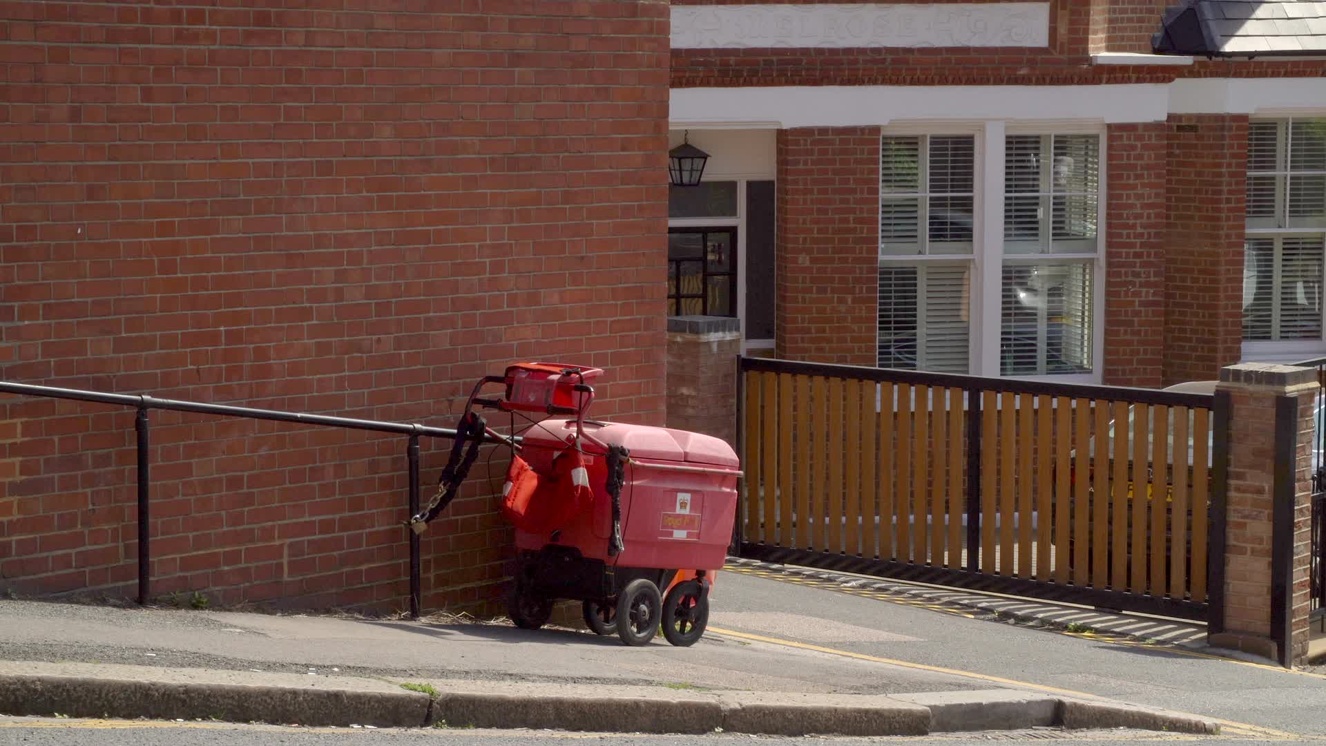 Royal Mail Cart in Urban Residential Street