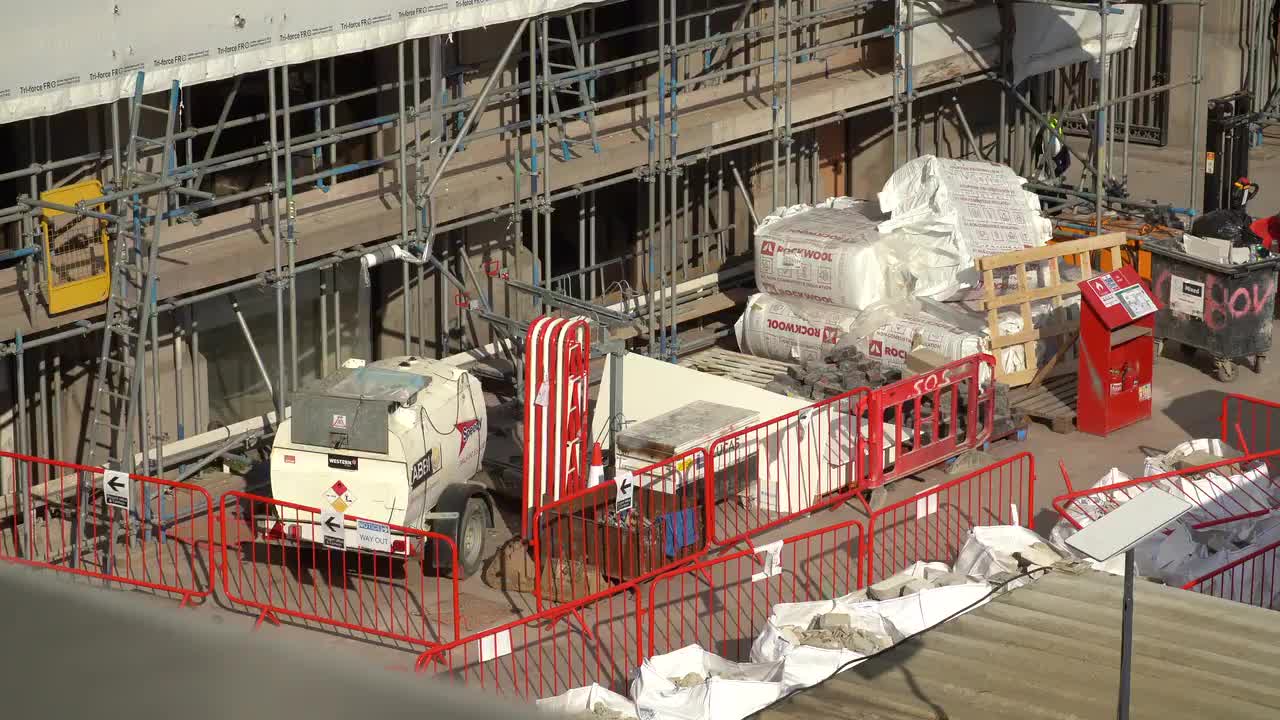 Urban Construction Site with Machinery and Materials