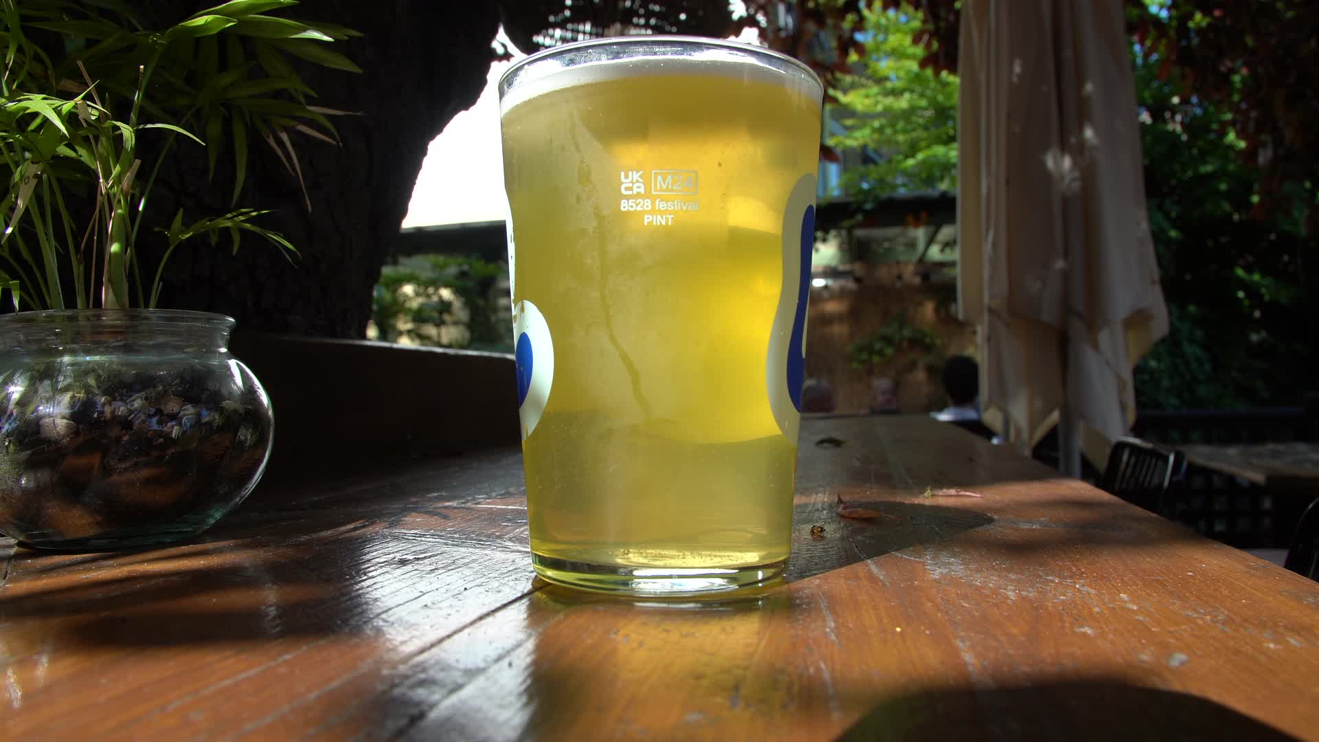 Chilled Pint of Beer in Sunlit Outdoor London Pub