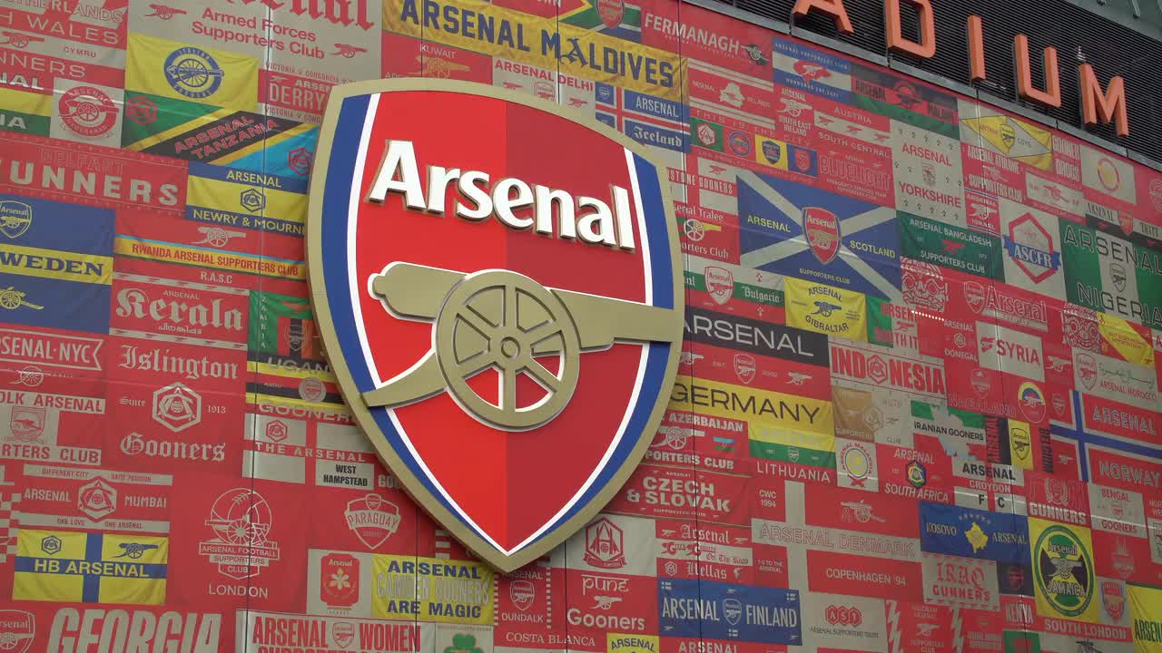 Arsenal Stadium Exterior with Branding and Flags