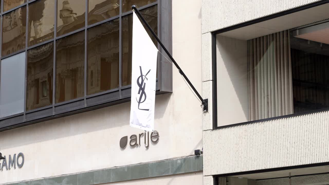 Yves Saint Laurent Fashion Storefront with YSL Flag