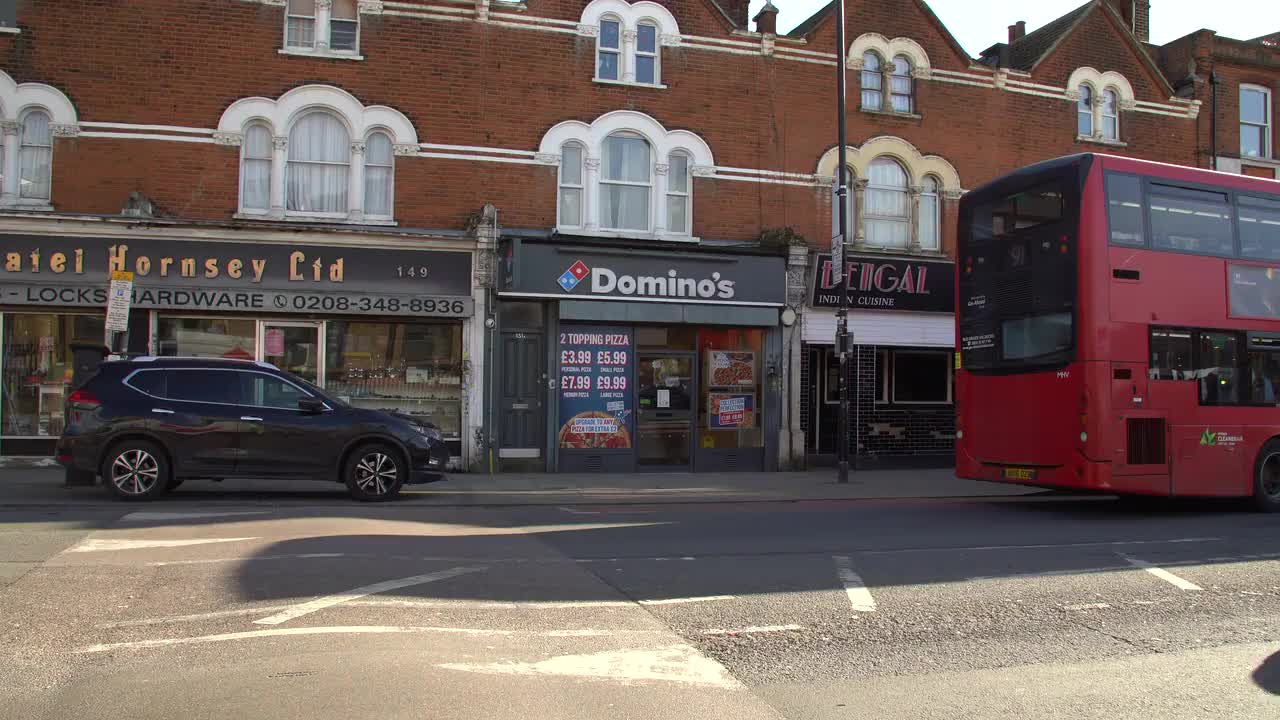 Urban Street Scene Outside Domino's in London