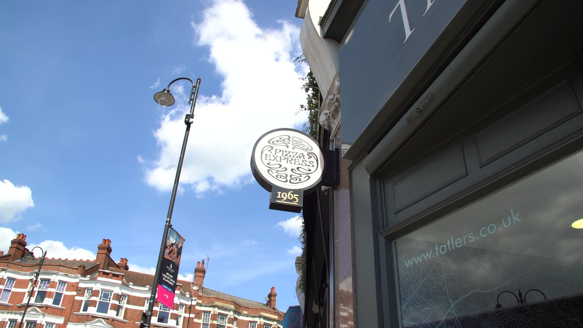 Pizza Express Storefront in Urban Setting