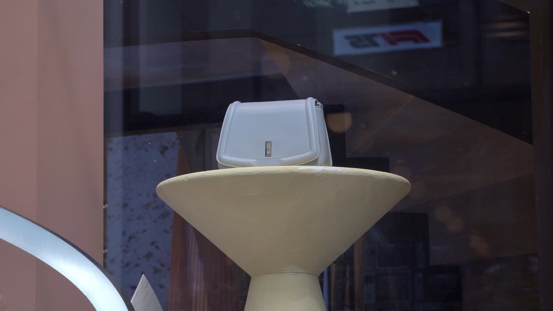 Luxury Handbag Display in Storefront Window