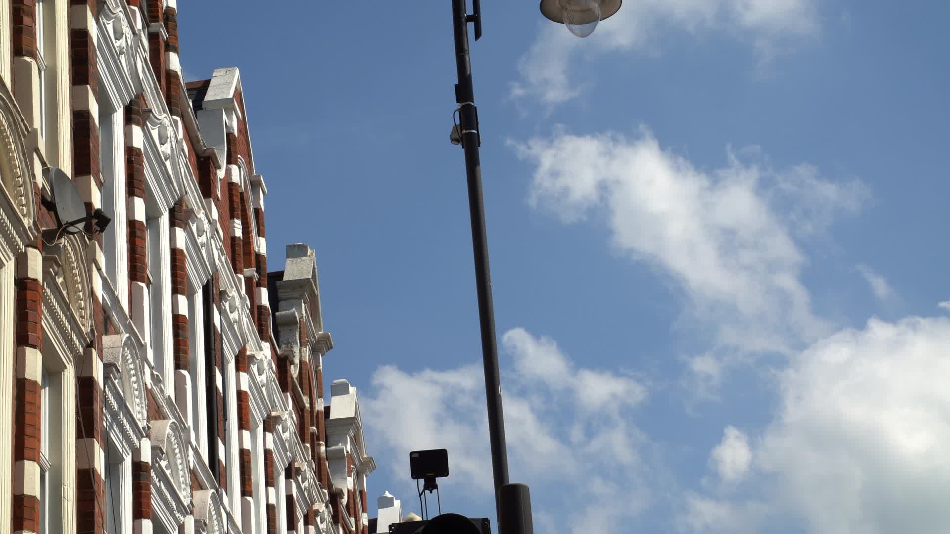 Sunny Street View of Classic Brick Architecture