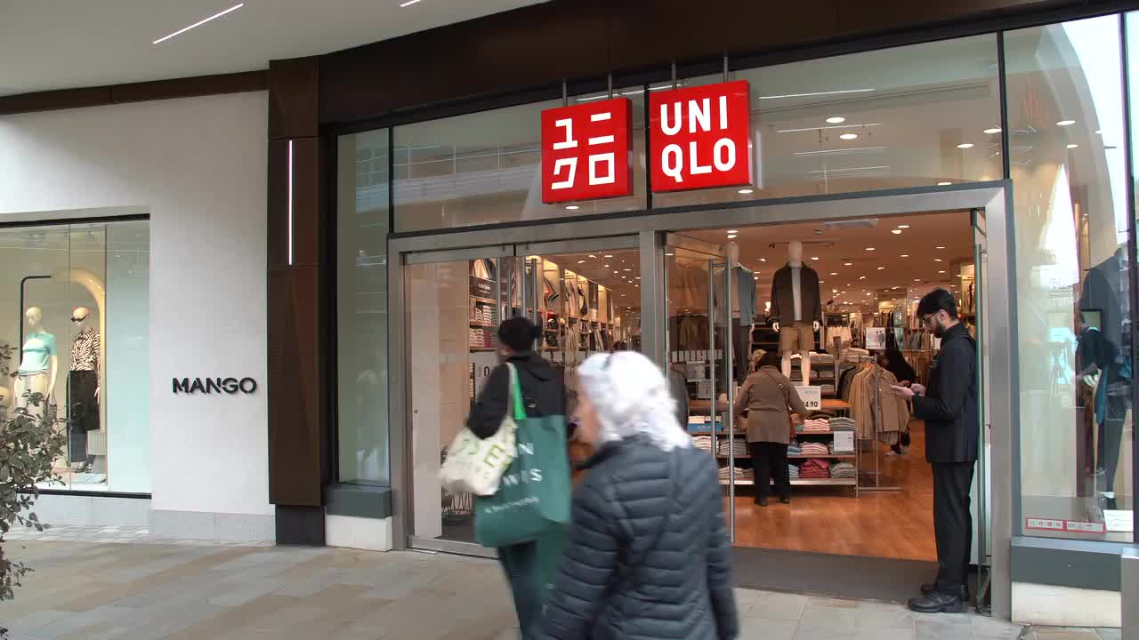 Uniqlo Storefront and Shoppers in Spring
