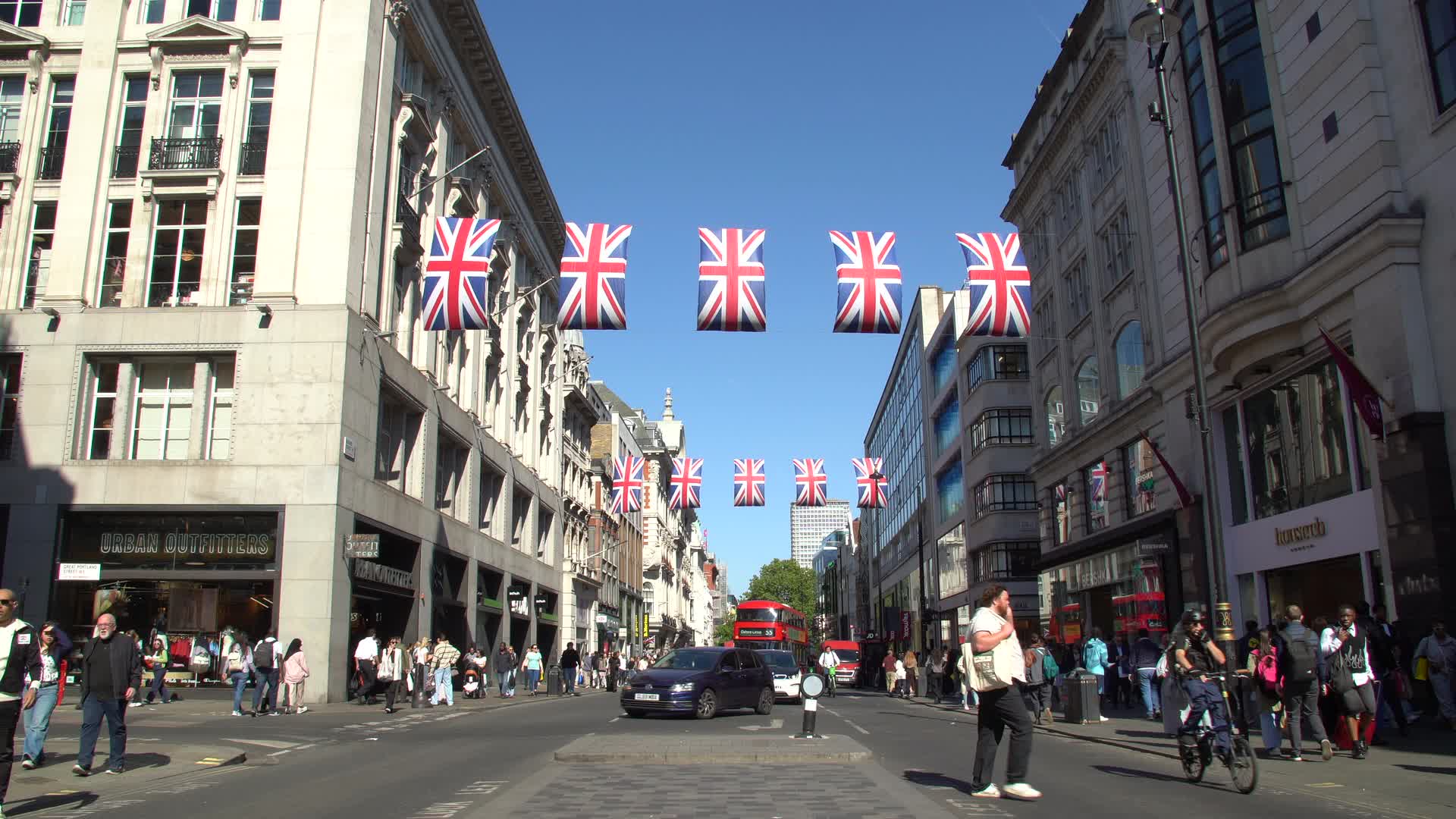 Vibrant Day on Oxford Street London with Union Jack Flags