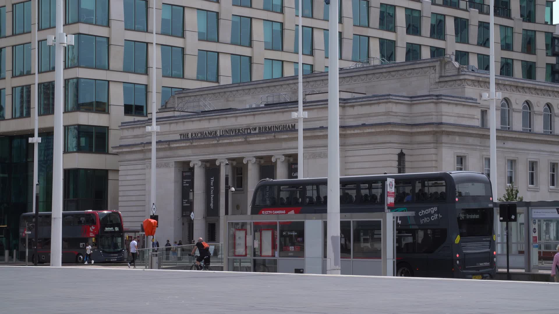 Centenary Square in Birmingham, UK Cityscape with Buses