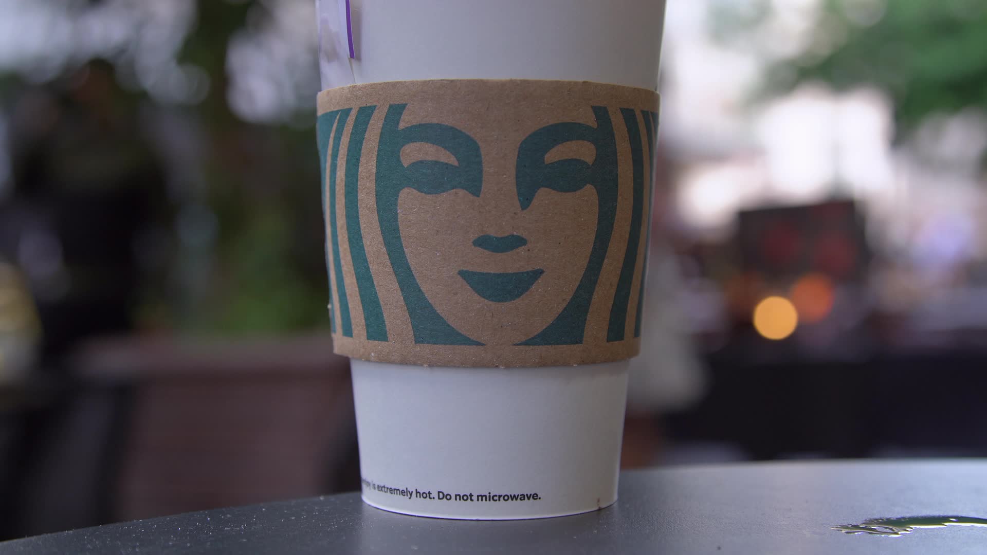 Close-up of a Starbucks Coffee Cup on a Table