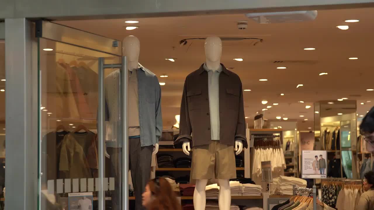 Inside Uniqlo Store - Fashion Display and Shoppers