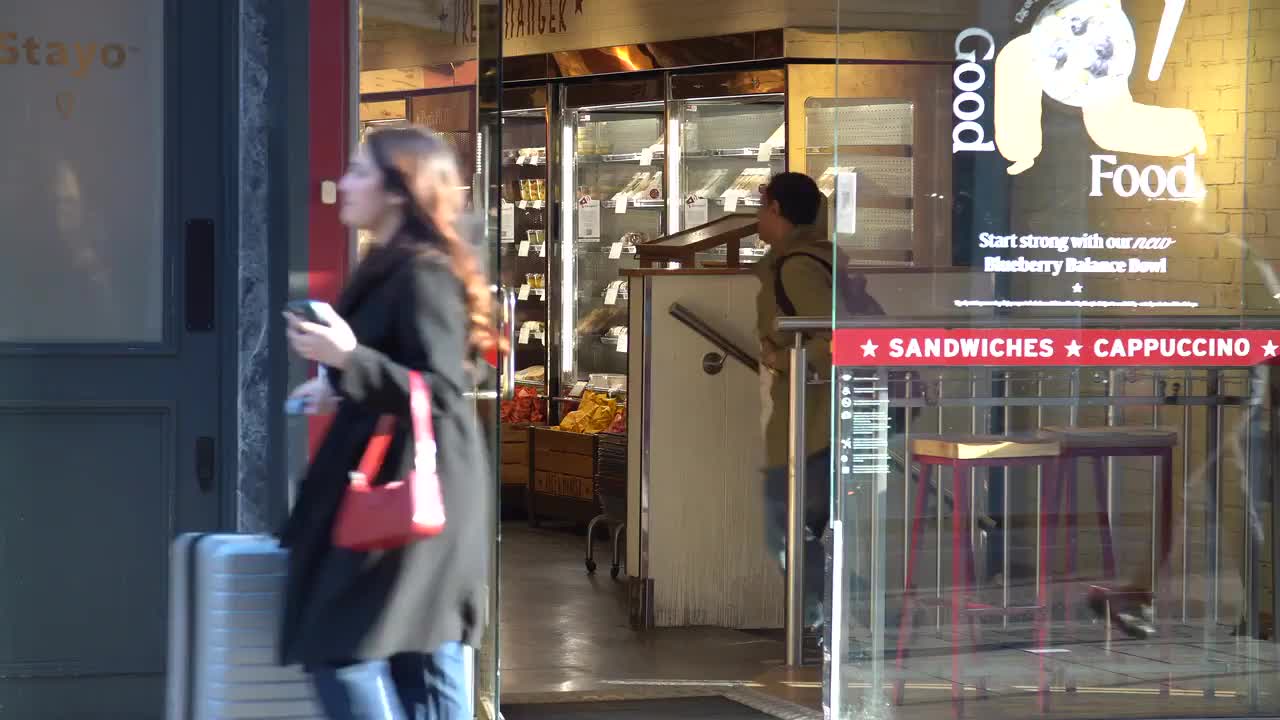 Busy Urban Cafe Entrance Scene in 4K