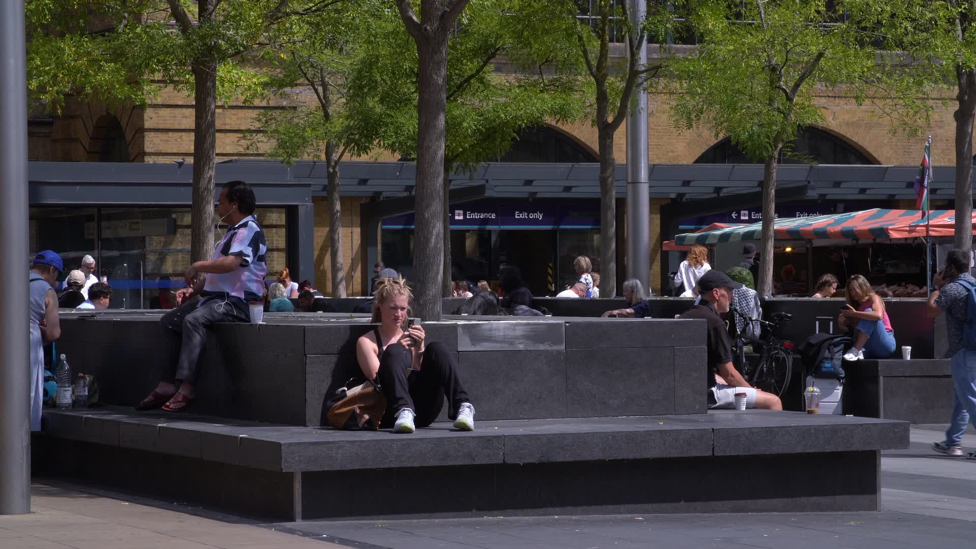 Urban Park Scene with People Relaxing