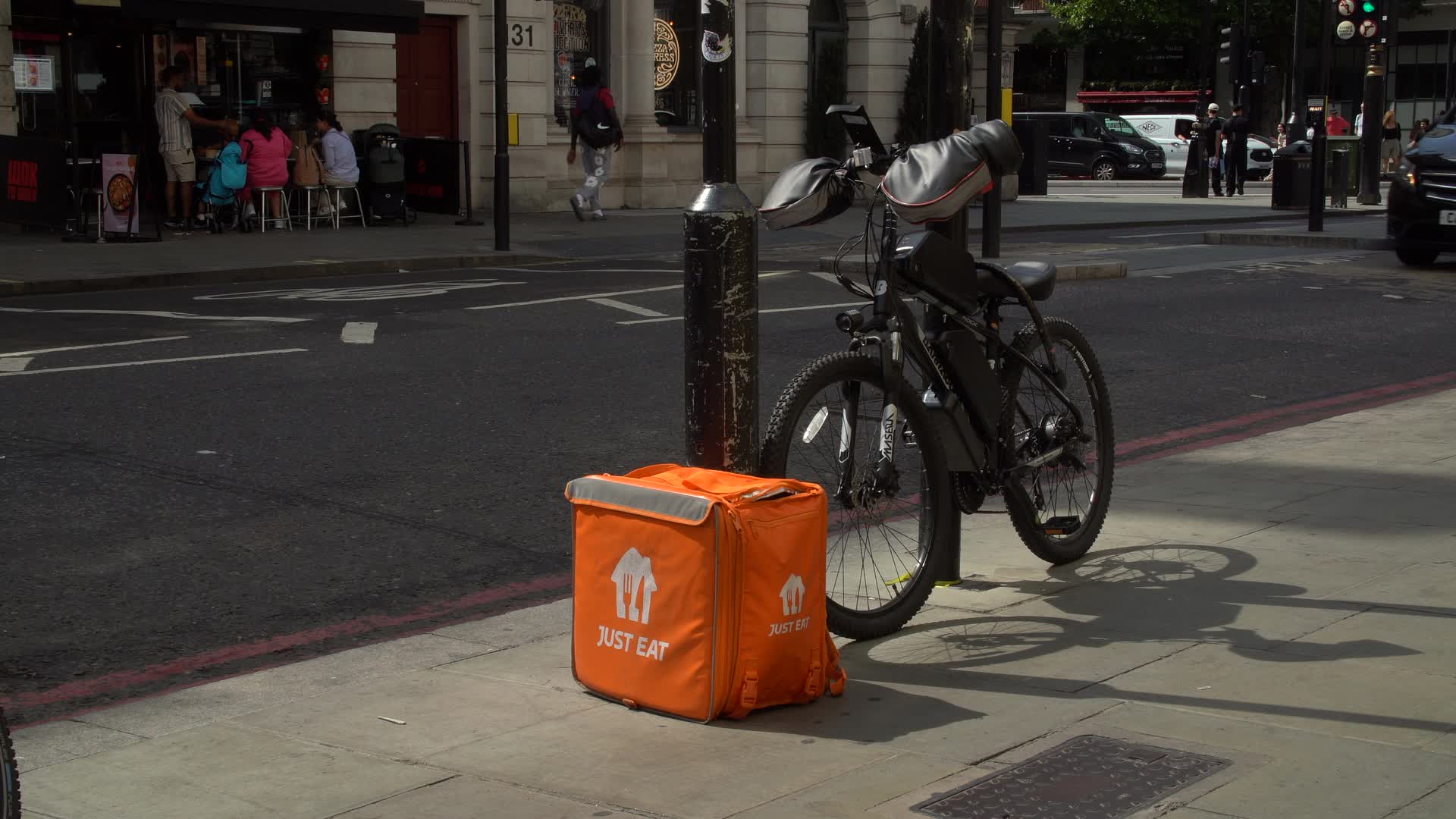 Just Eat Courier Bicycle in London Urban Setting