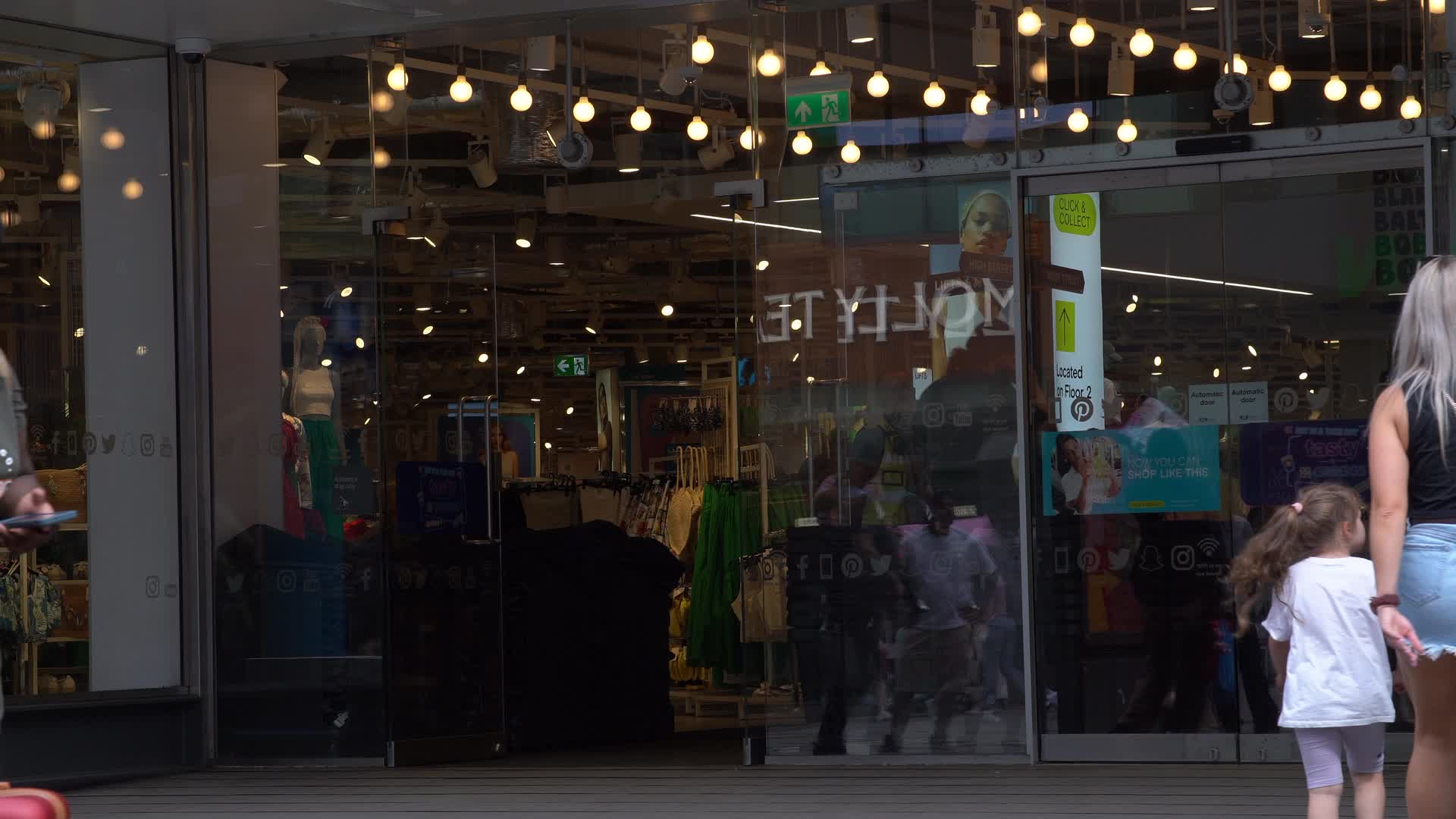 Primark Storefront and Shoppers Outside - June Footage