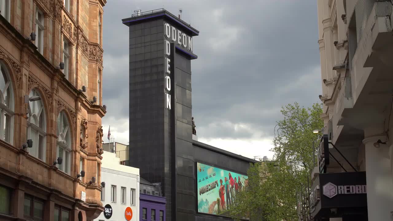 Odeon Cinema Exterior View on Cloudy Day