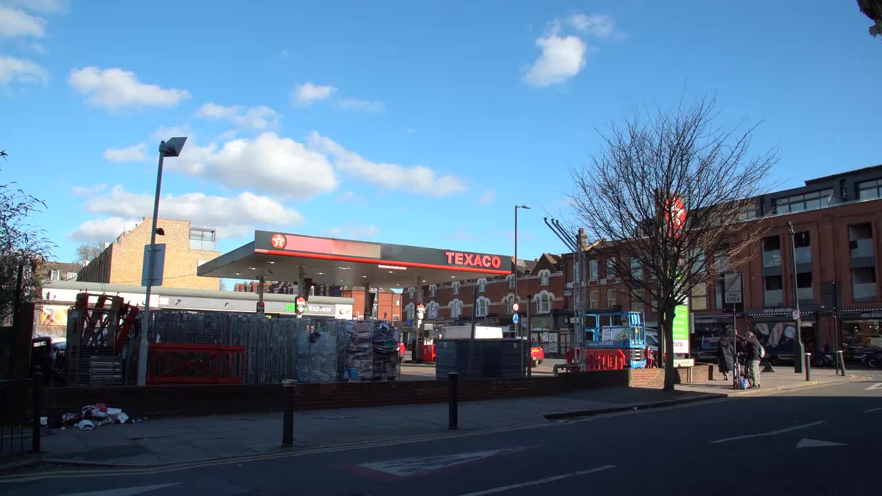 Texaco Gas Station on Sunny Day in Urban Setting