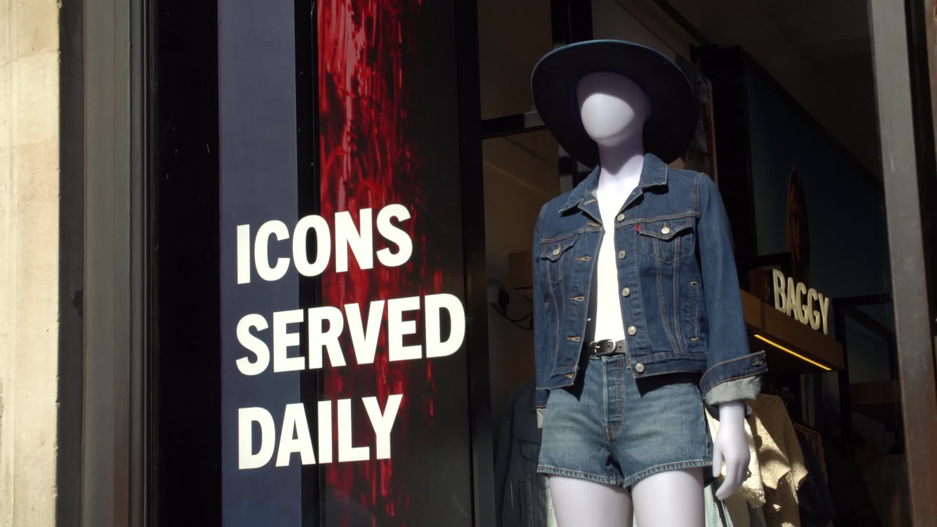 Storefront Display of Denim Fashion with Mannequin