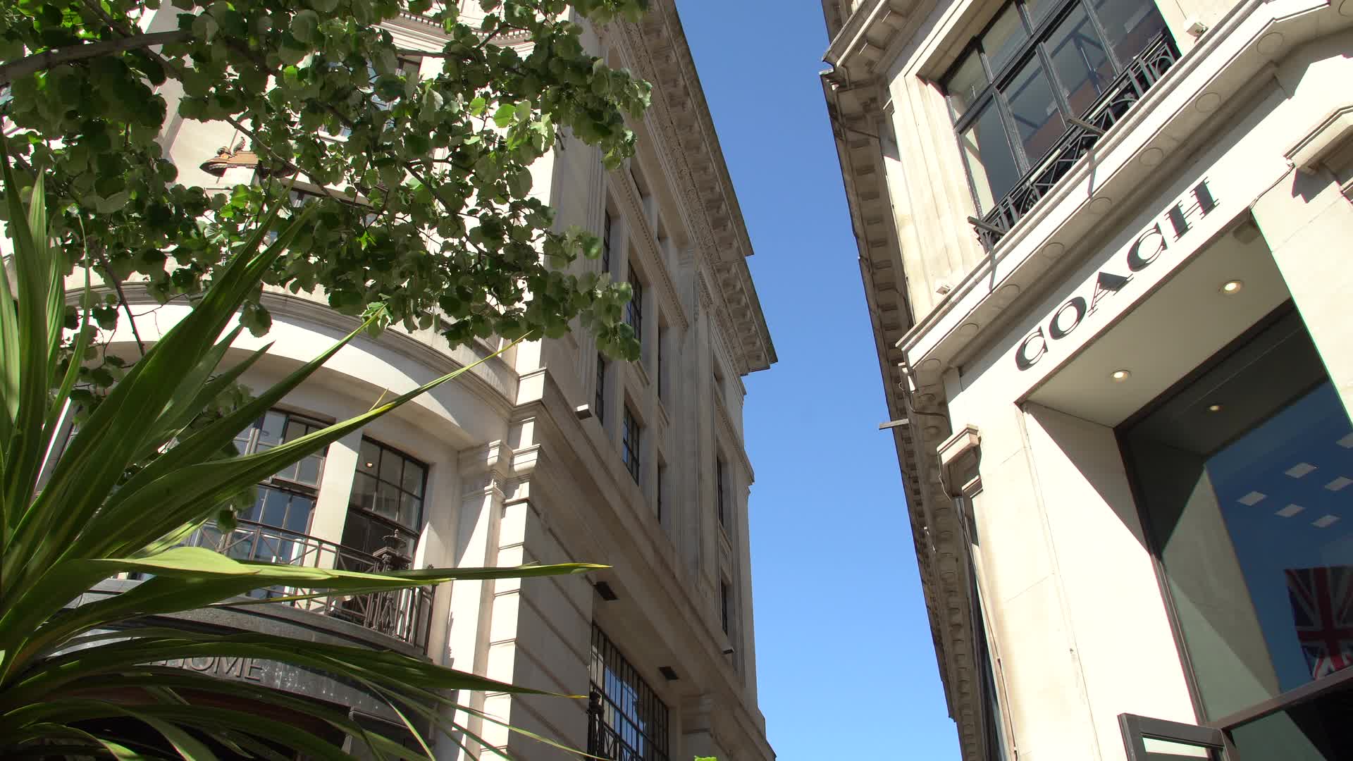 Scenic Urban View Near Coach Storefront