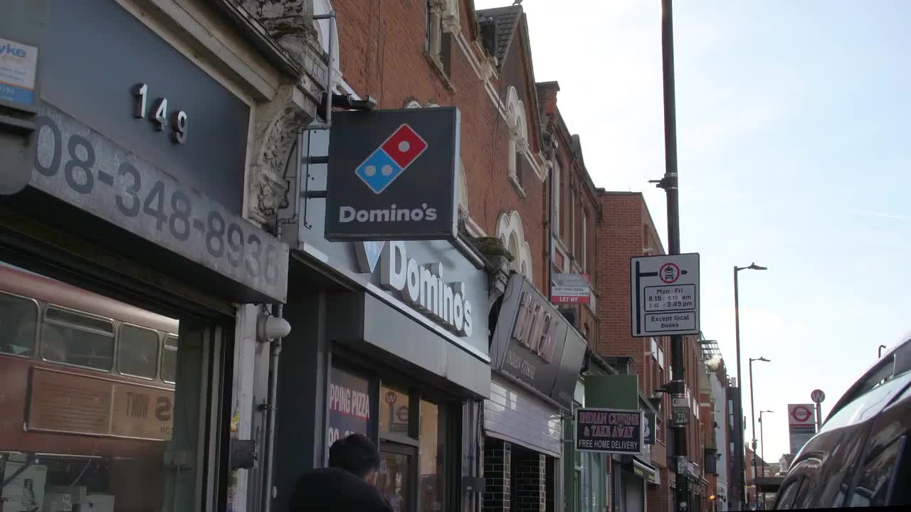 Urban Street View Featuring Domino's Pizza Storefront