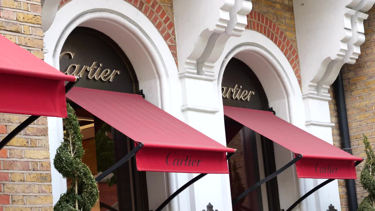 Elegant Cartier Storefront with Red Awnings in London