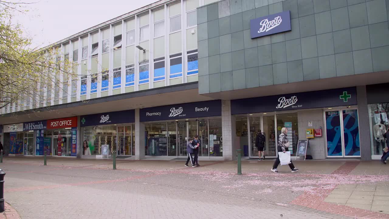 Local Shopping Center with Boots Storefront