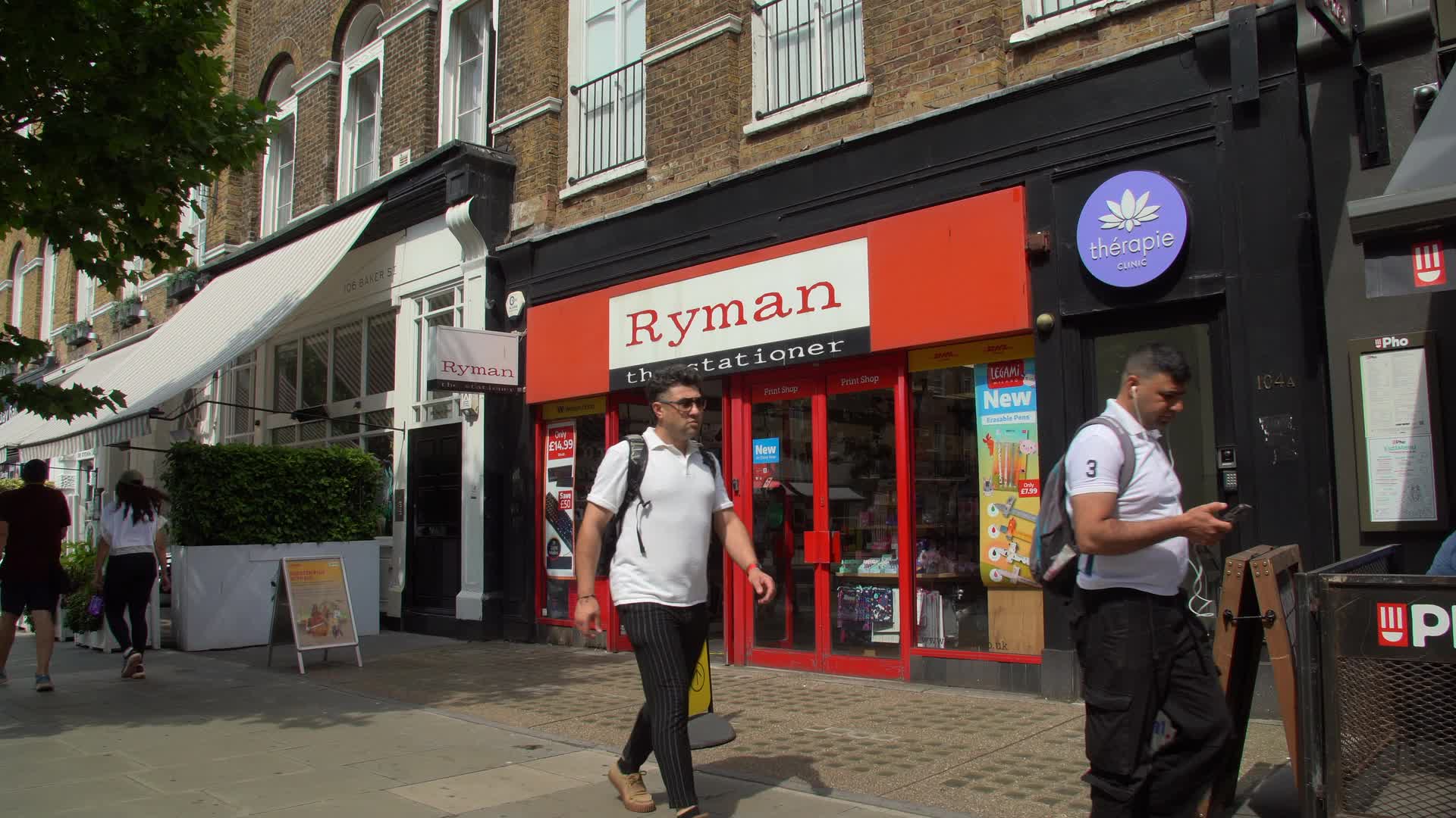 Exterior of Ryman Stationery Store on Busy Street in London 