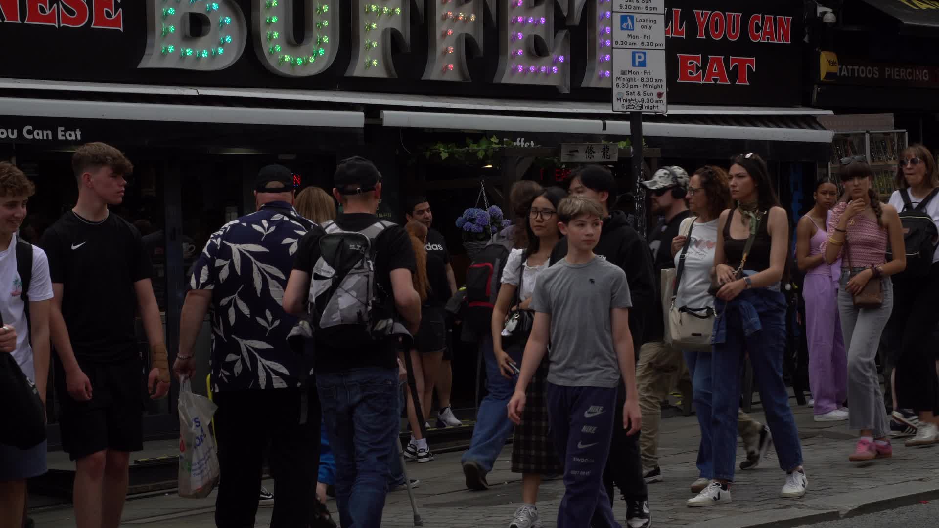 Crowds Walking Along High Street in Camden, London
