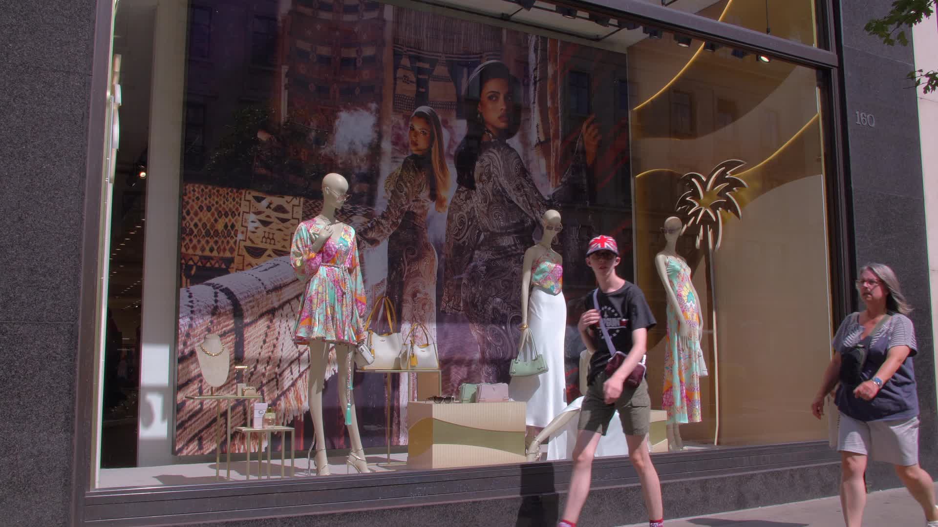 Fashion Storefront with Summer Dresses Display